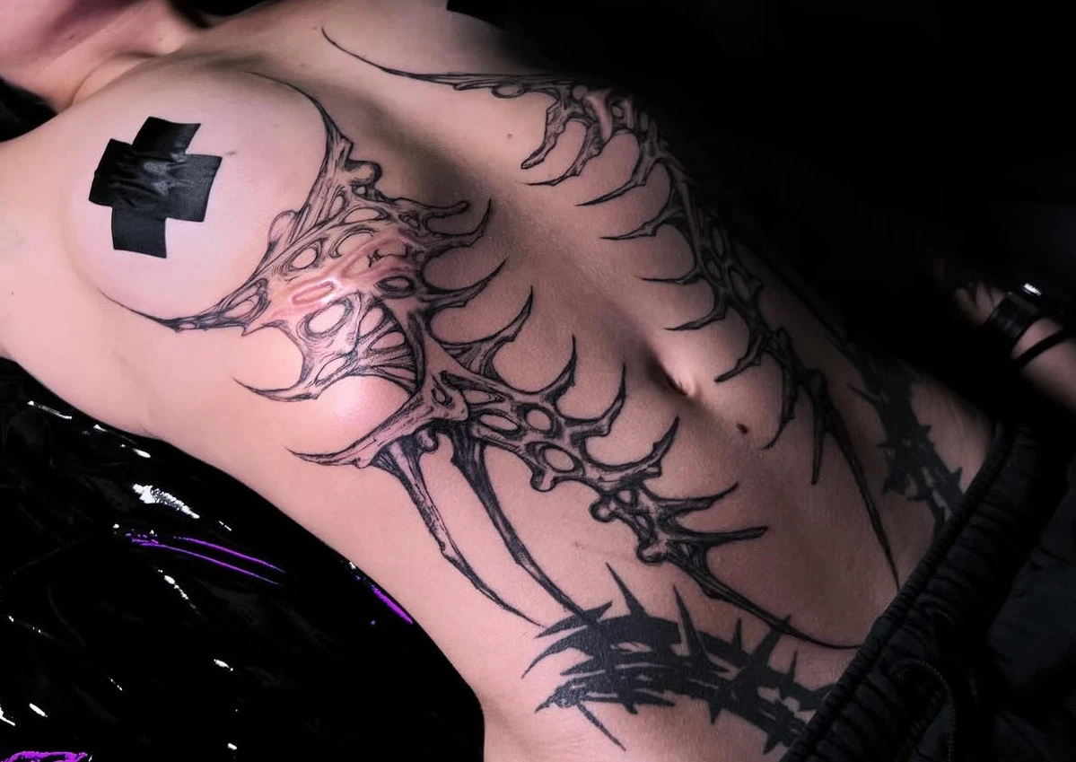 Bio Organic & Tribal and Blackwork tattoo by Liza