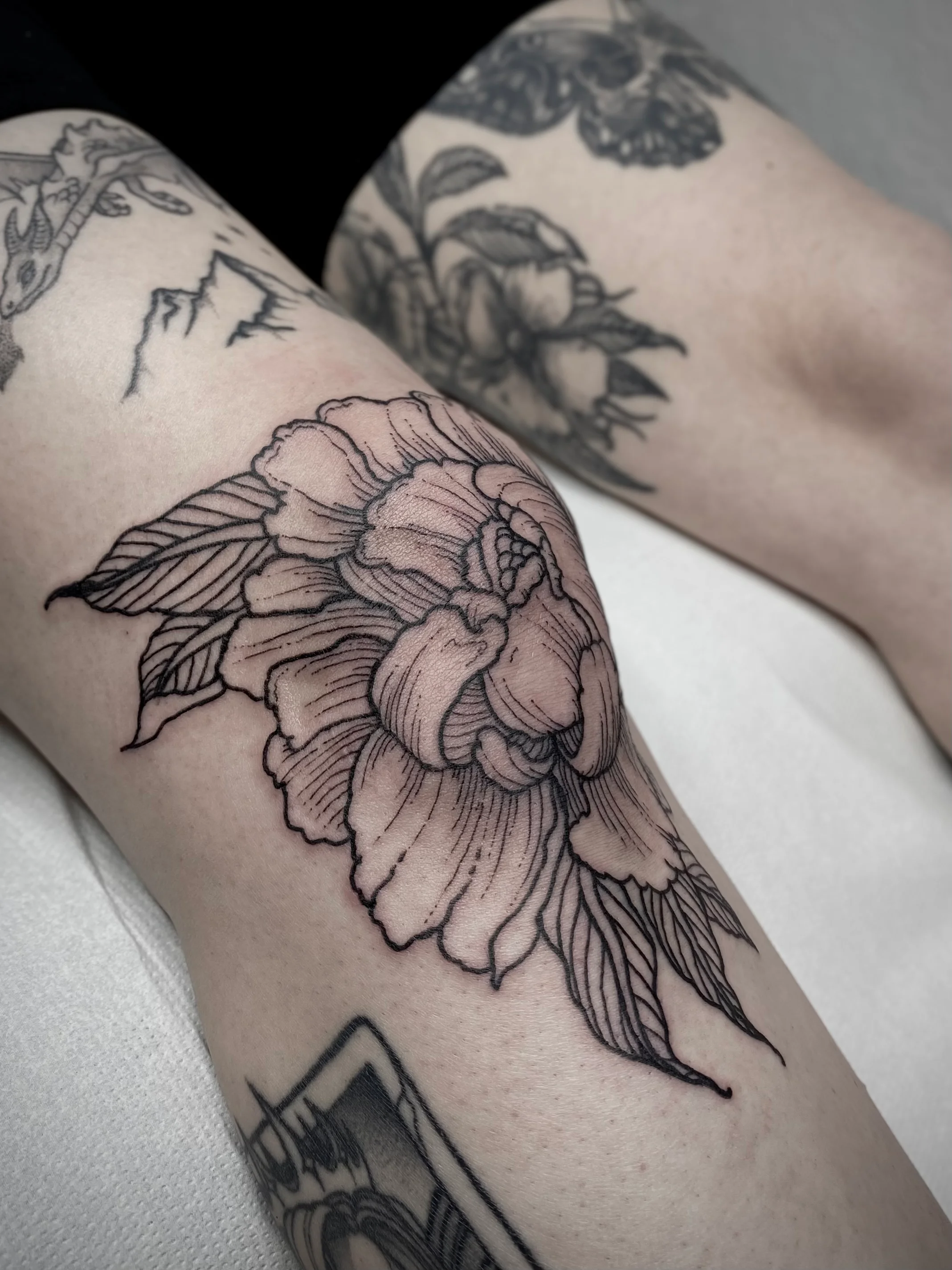 Engraving and Floral & Botanic tattoo by Gil