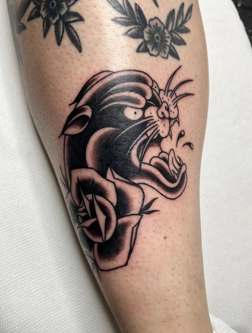 Blackwork and Traditional & Old School tattoo by Sarah