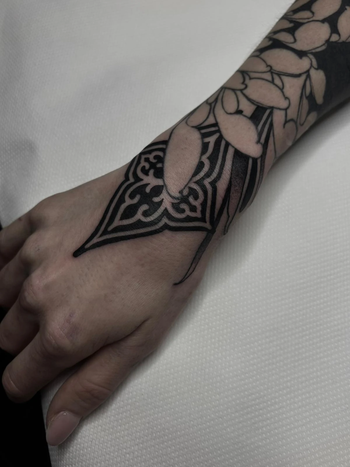 Ornamental and Blackwork tattoo by Sinah Ra