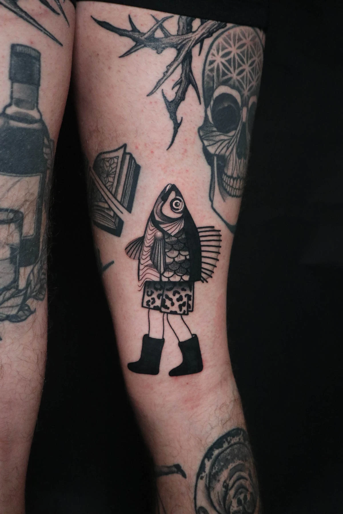 Blackwork and Surrealism tattoo by Ed Zlotin