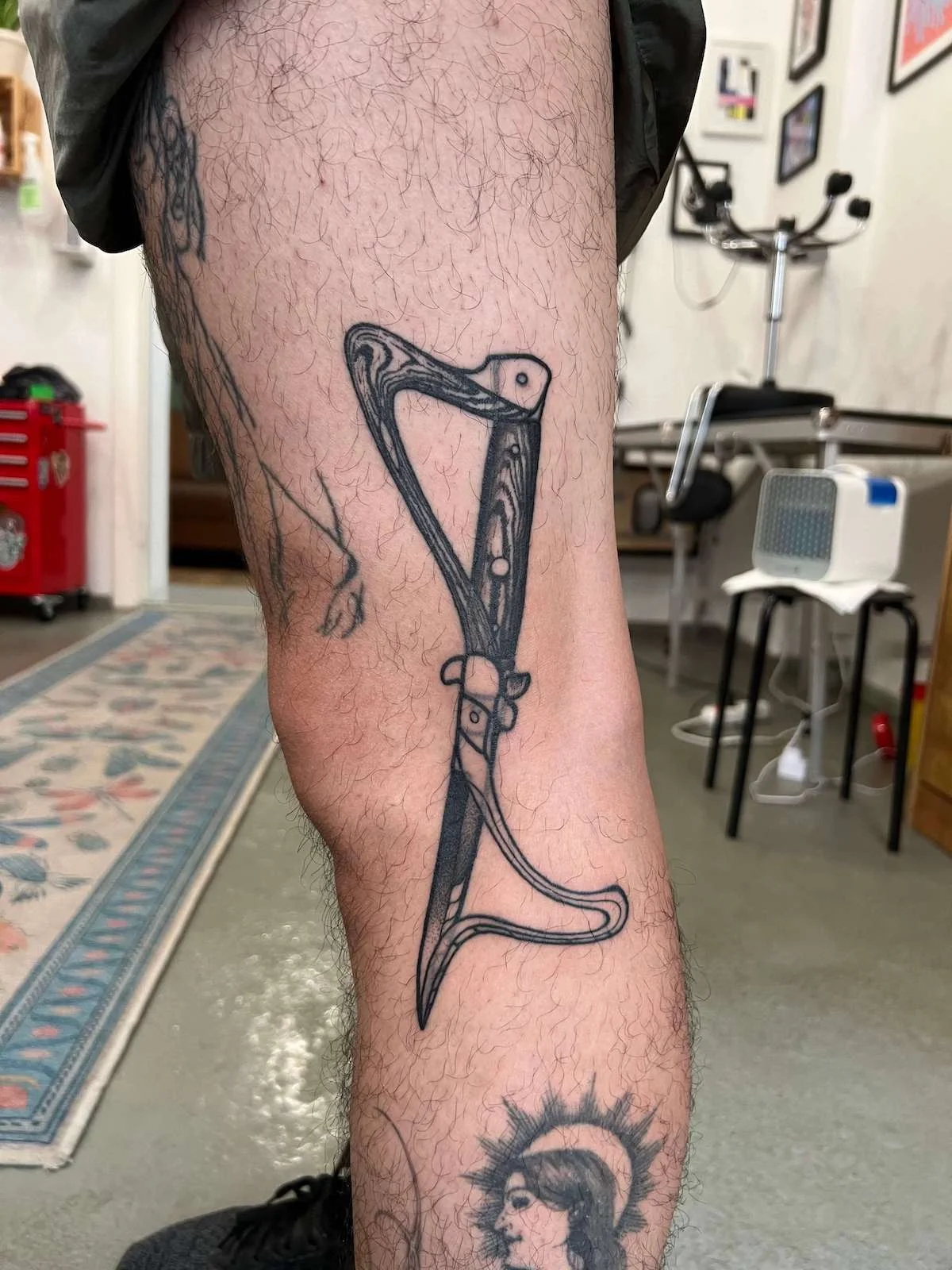 Blackwork and Surrealism tattoo by Ed Zlotin