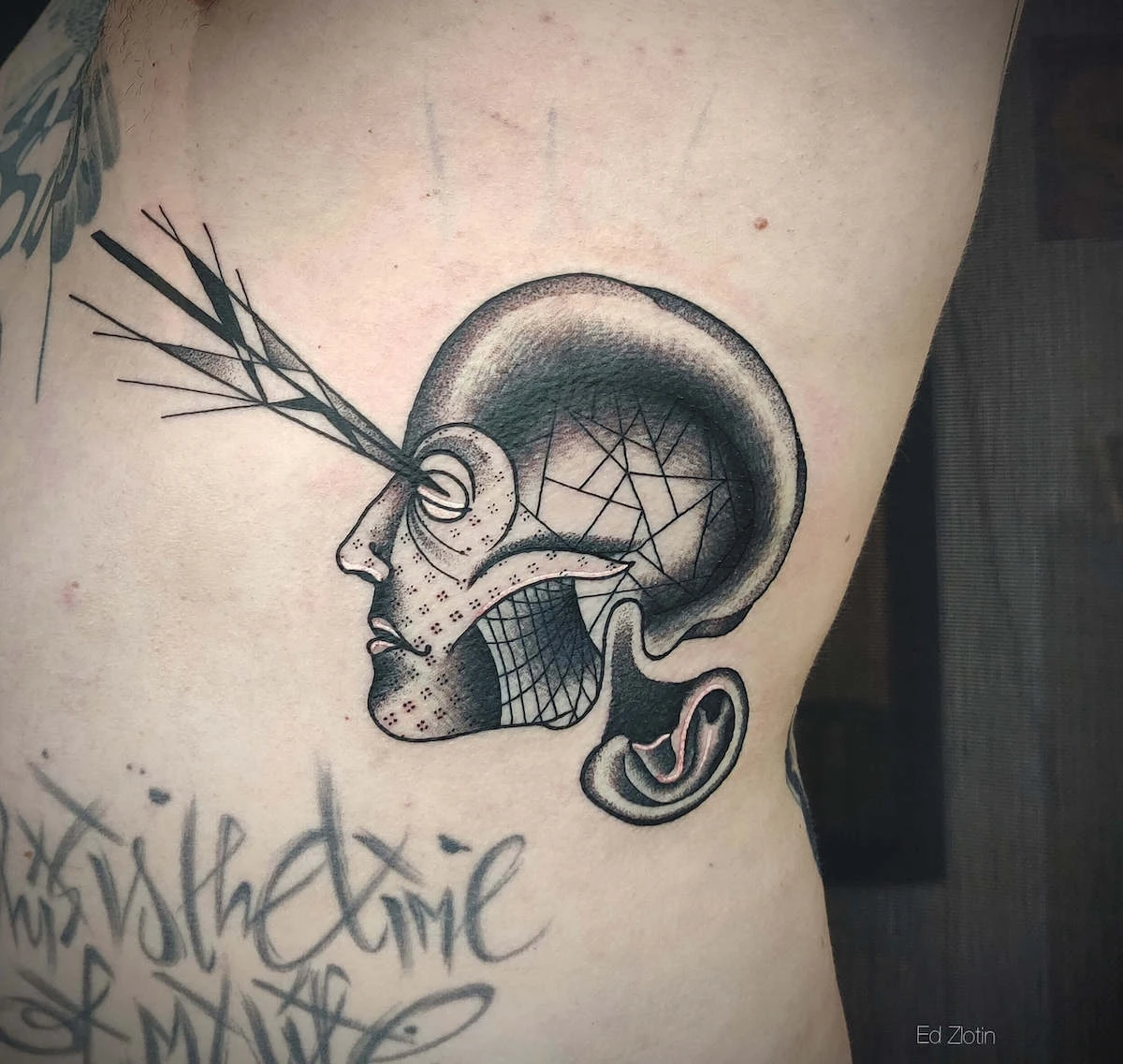 Blackwork and Surrealism tattoo by Ed Zlotin