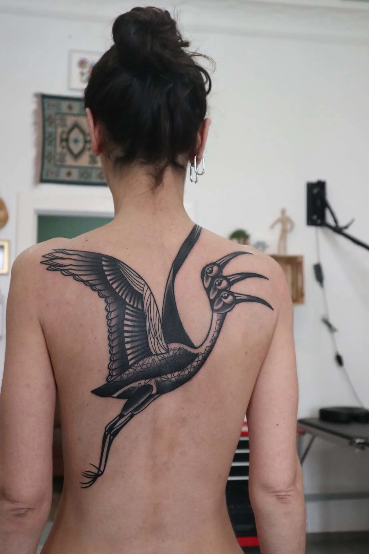 Surrealism and Blackwork tattoo by Ed Zlotin