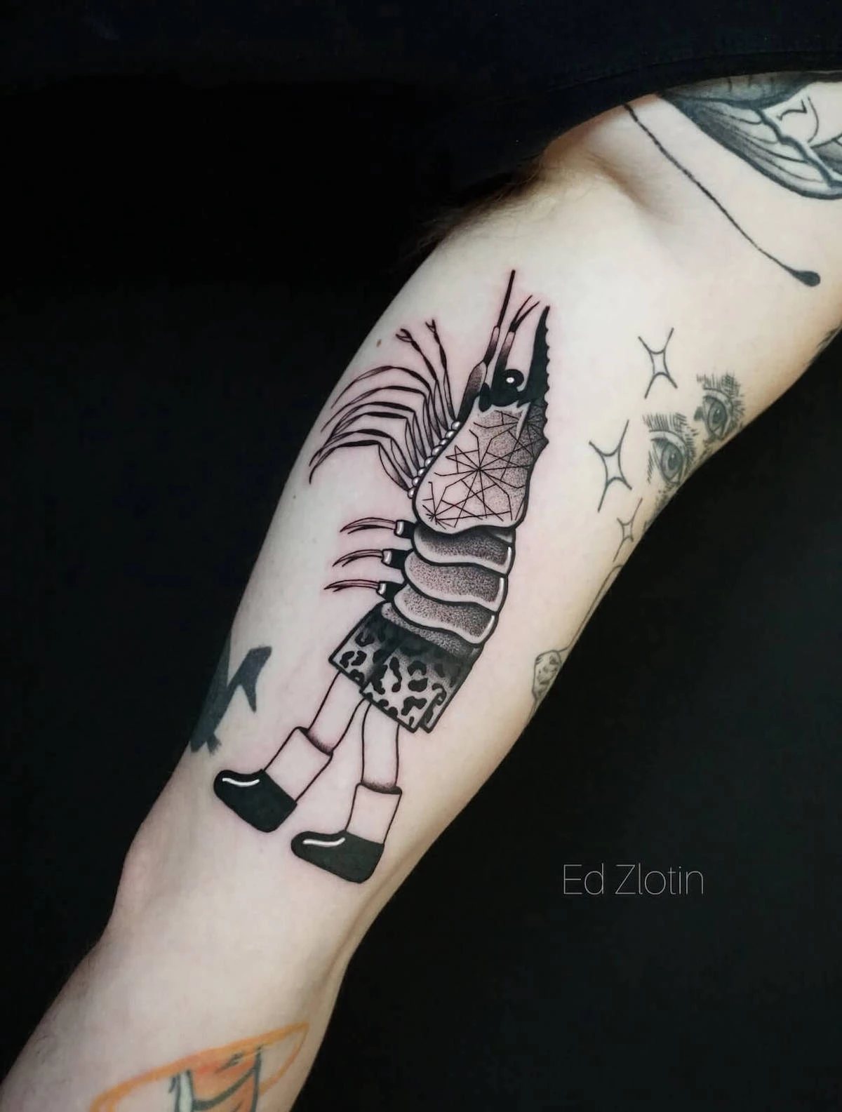 Surrealism and Blackwork tattoo by Ed Zlotin