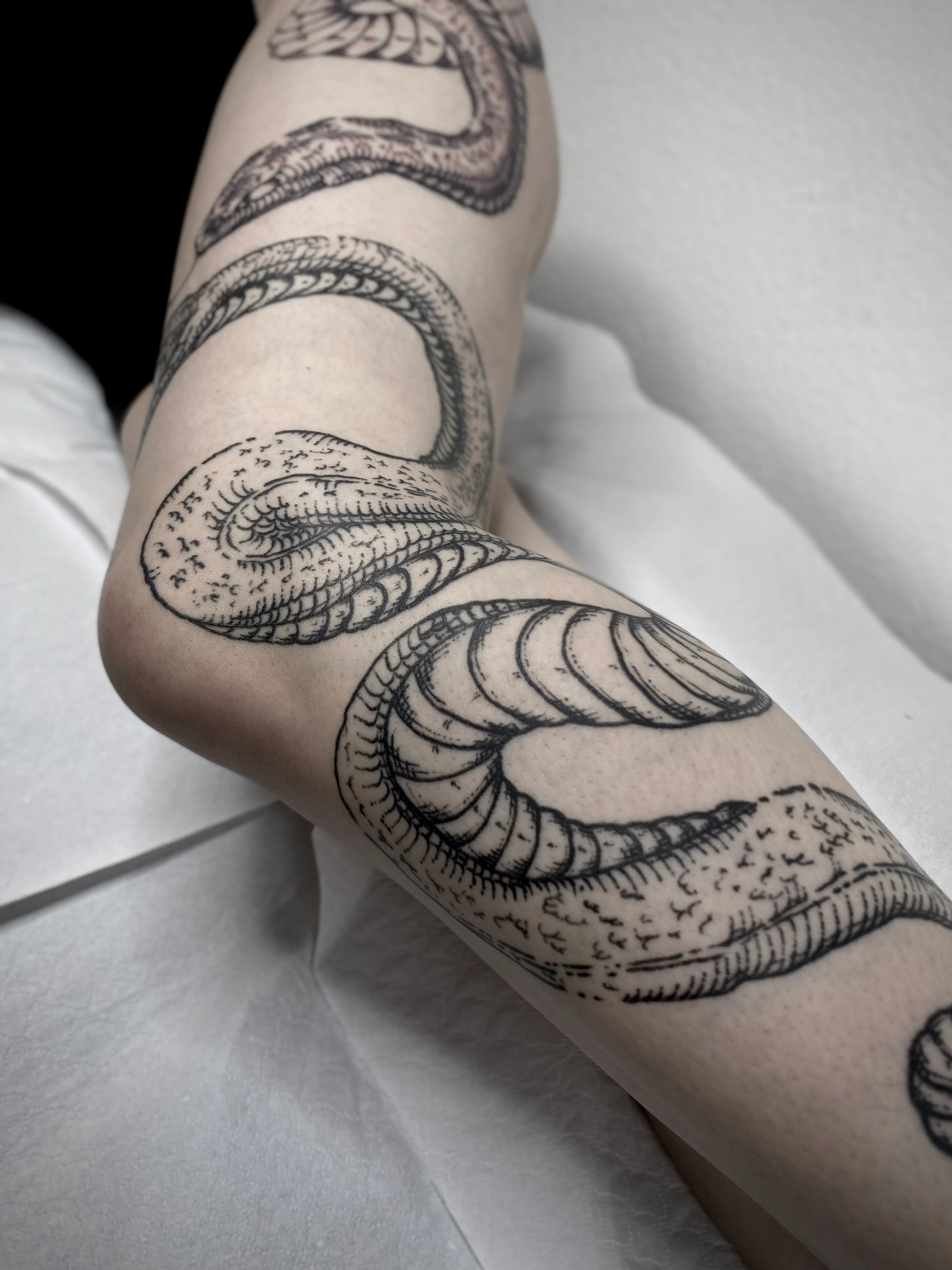 Linework and Engraving tattoo by Gil