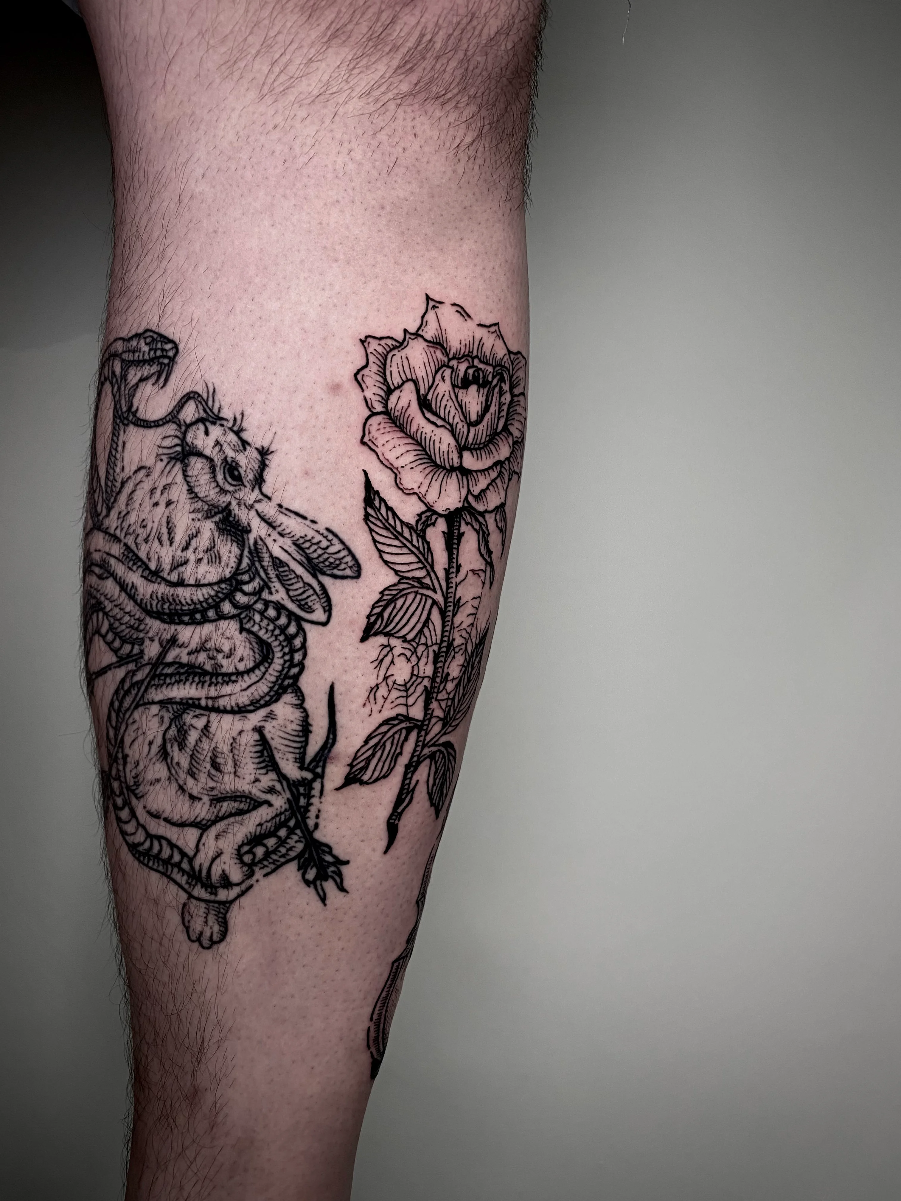 Linework and Engraving tattoo by Gil